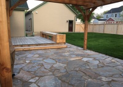 Beautiful Stone Patio, Bench and Pergola